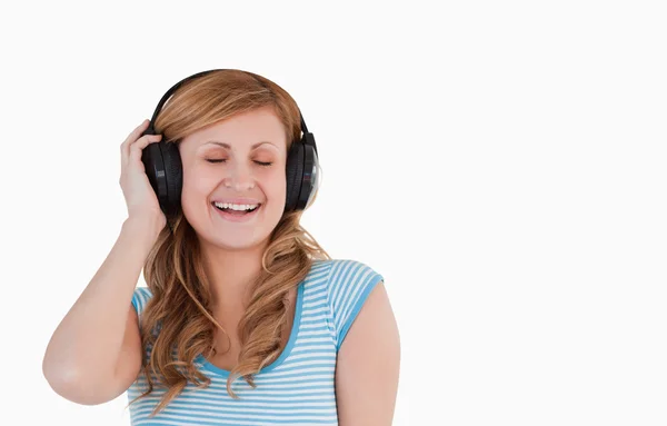 Isolated woman listening to music — Stock Photo, Image