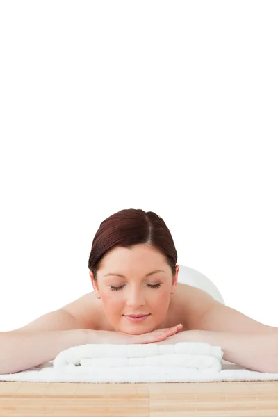 Attractive red-haired woman relaxing in a spa centre — Stock Photo, Image