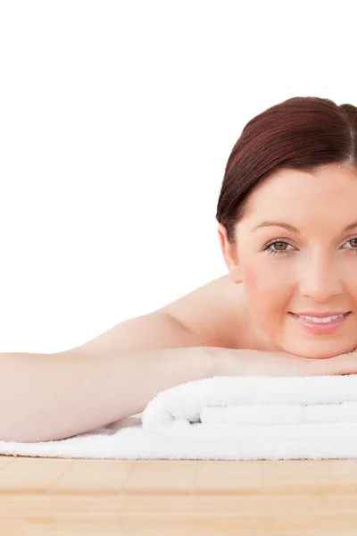 Good looking red-haired woman posing while relaxing in a spa cen — Stock Photo, Image