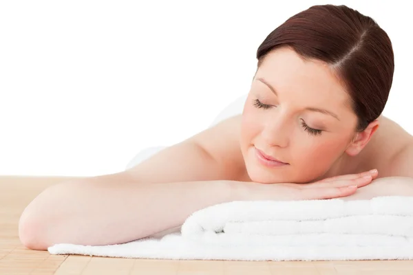 Pretty red-haired woman posing while relaxing in a spa centre — Stock Photo, Image
