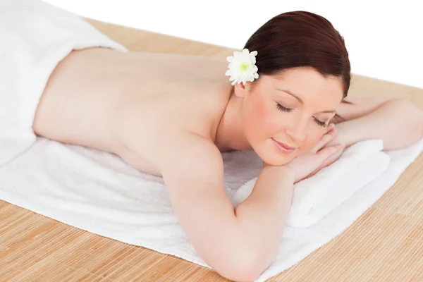 Portrait of a beautiful serene woman posing while relaxing in a — Stock Photo, Image