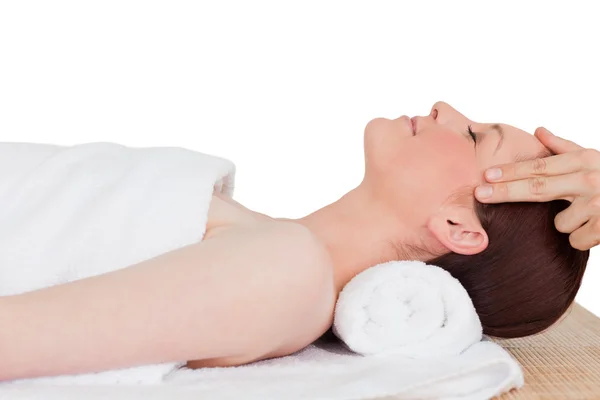 stock image Closeup of a pretty serene woman posing while relaxing in a spa