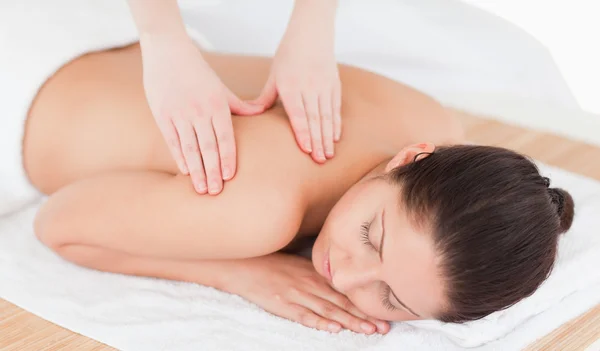 Young woman having a back massage — Stock Photo, Image