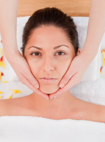 Pretty woman having a facial massage — Stock Photo, Image