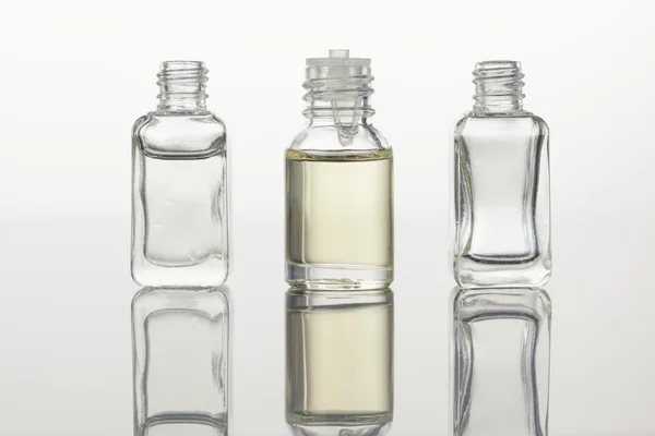 Glass flasks against a white background — Stock Photo, Image
