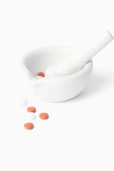 Mortar and pestle with pills — Stock Photo, Image