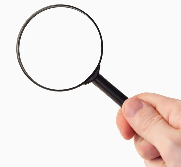 stock image Hand holding a magnifying glass