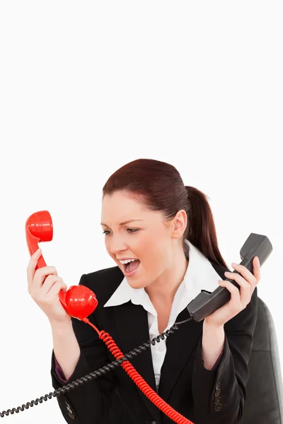 Krásná sekretářka crazy poháněn telefonní hovory — Stock fotografie