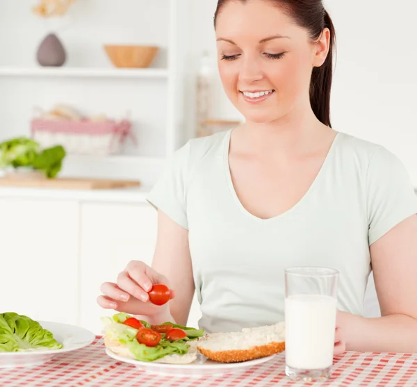 Charming woman ready to eat a sandwich for lunch — Stock Photo, Image
