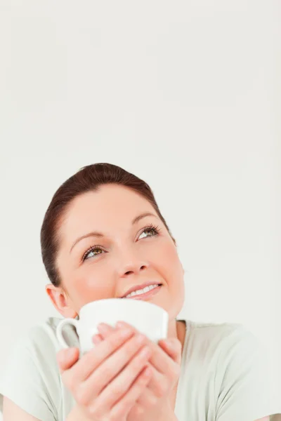 Attractive female posing while holding a bowl — Stock Photo, Image