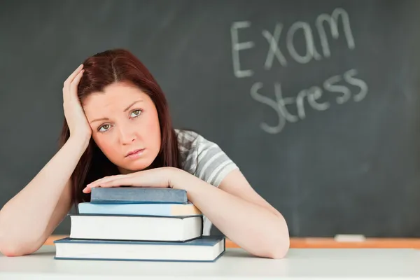Beautilful student stressed by her examinations — Stock Photo, Image