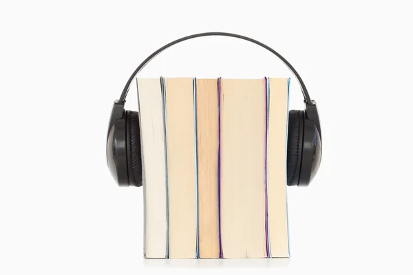 Některé knihy a sluchátka — Stock fotografie