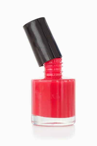Opened red nail polish flask — Stock Photo, Image