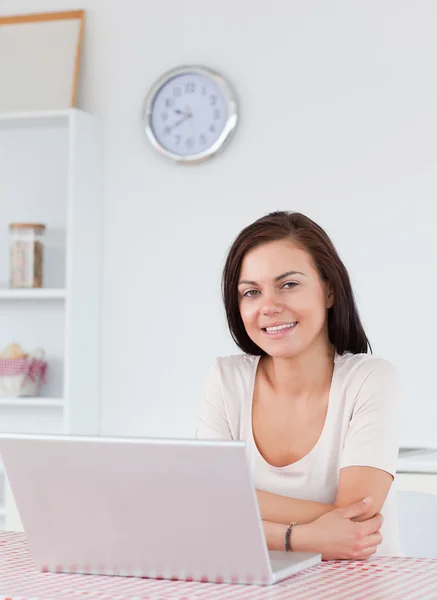 Portrait of a cute woman with a laptop — Stock Photo, Image