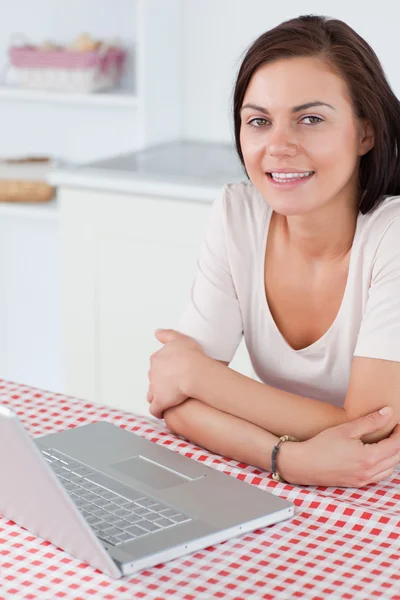 Portrait of a charming woman with a laptop — Stock Photo, Image