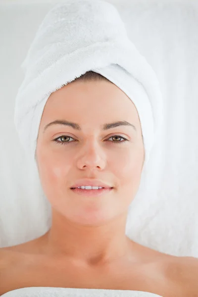 Portrait of a young woman wearing a towel — Stock Photo, Image