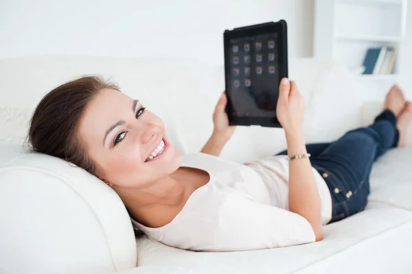 Close up of a beautiful woman using a tablet — Stock Photo, Image