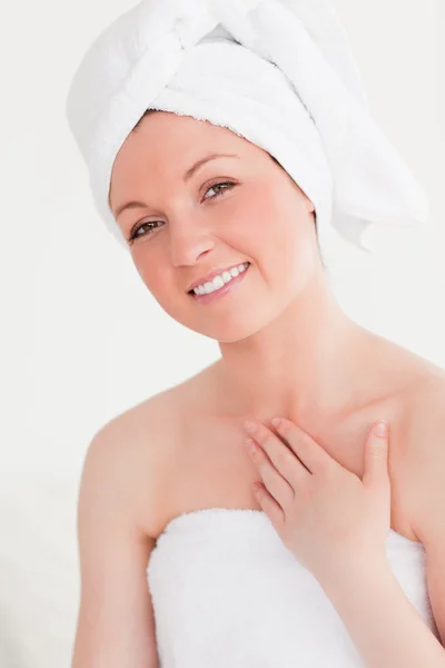 Gorgeous young woman wrapped in a towel Stock Picture