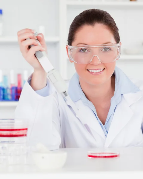 Portrait of a redhead scientist preparing a sample Stock Photo