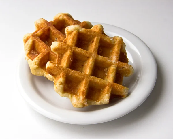 stock image Sweet waffles on plate on white background