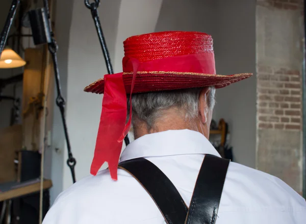 stock image Cheese carrier from the back near the ancient scales, Alkmaar ch