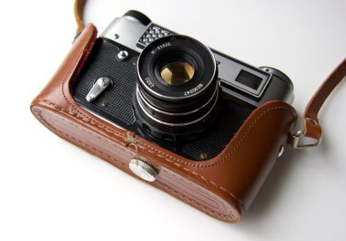 Old rangefinder vintage camera on white background clipart