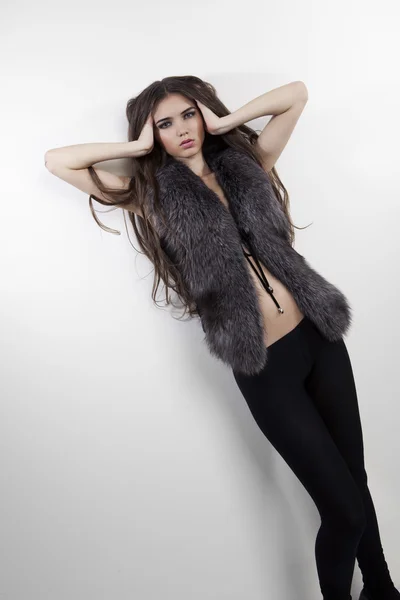 Portrait of a beautiful woman wearing fur — Stock Photo, Image