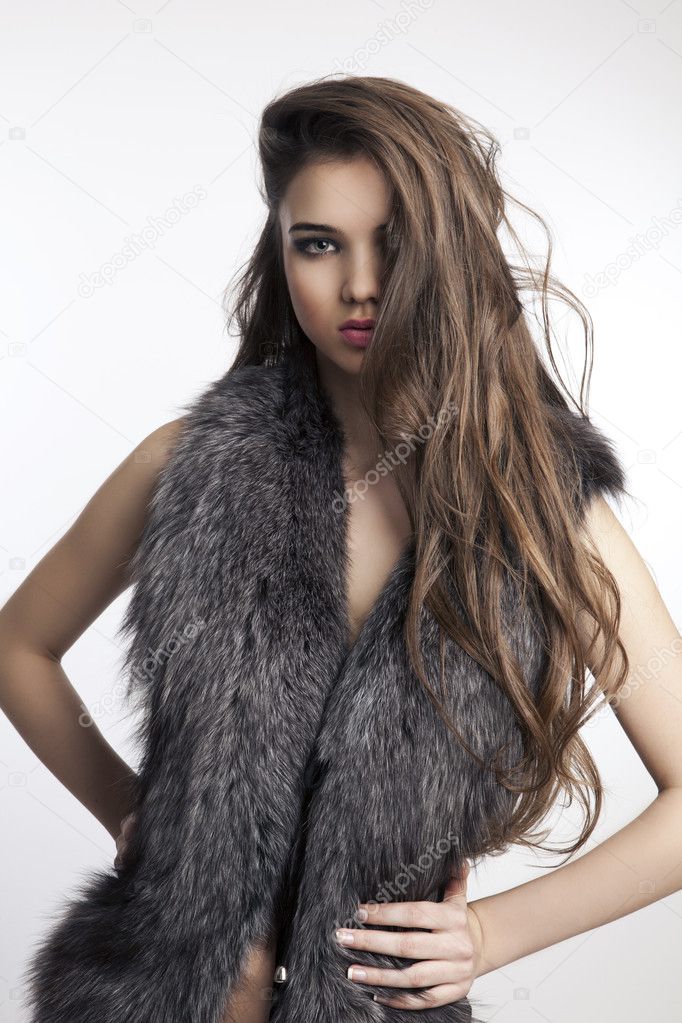 Portrait of a beautiful woman wearing fur