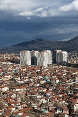 Rising Apartments Among Old Houses clipart