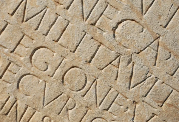 Écriture romaine comme toile de fond — Photo