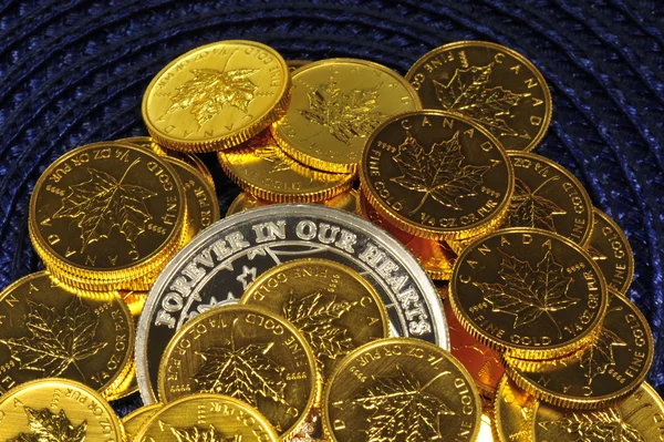 Gold coins on a blue background — Stock Photo, Image