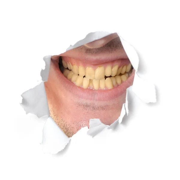 紙の穴の中の顎 — ストック写真