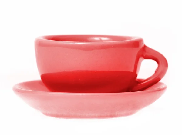 Kubek czerwony i talerzyk na białym tle — Zdjęcie stockowe