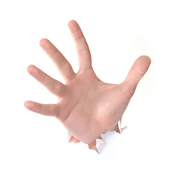 Mão perfurando através de papel — Fotografia de Stock