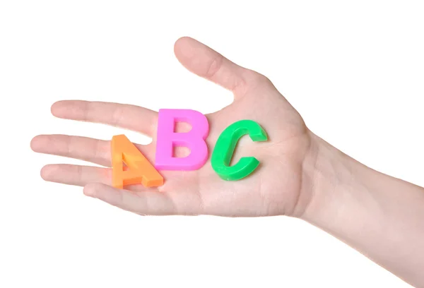 stock image A B C letters in hand isolated on white