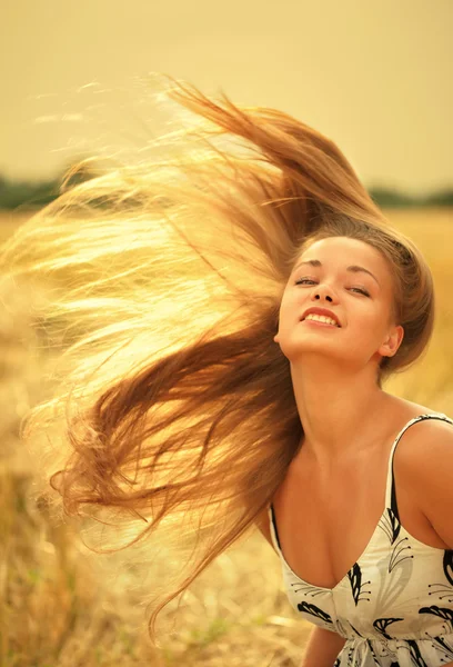 Woman with magnificent hair Stock Image