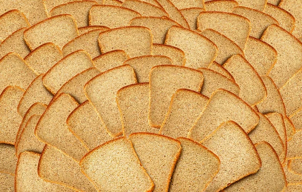 Wiele kromki chleba jako tło — Zdjęcie stockowe