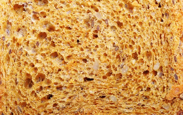 Zblízka texturu chleba jako pozadí — Stock fotografie