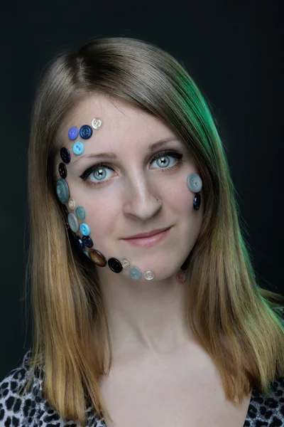Creative portrait of girl with buttons — Stock Photo, Image