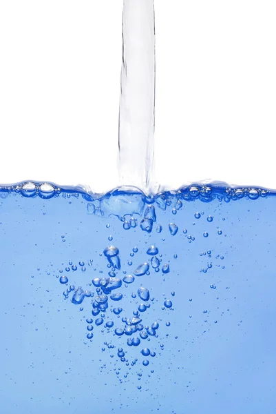 Strömmande vatten med bubblor — Stockfoto