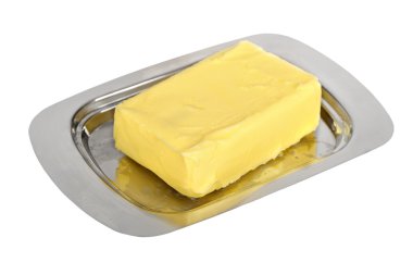 Butter on silver butter dish clipart