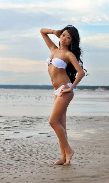 Asian woman in white bikini — Stock Photo, Image