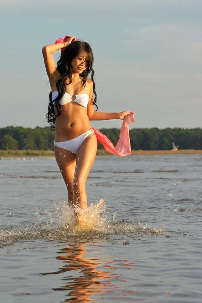 Asian woman in white bikini — Stock Photo, Image