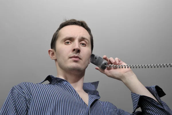 Uomo che parla per telefono — Foto Stock