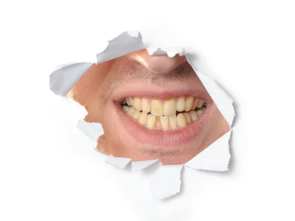 Jaws in a hole of paper — Stock Photo, Image
