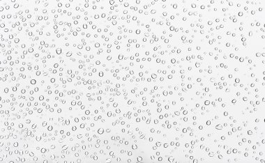 Many little water drops on glass clipart