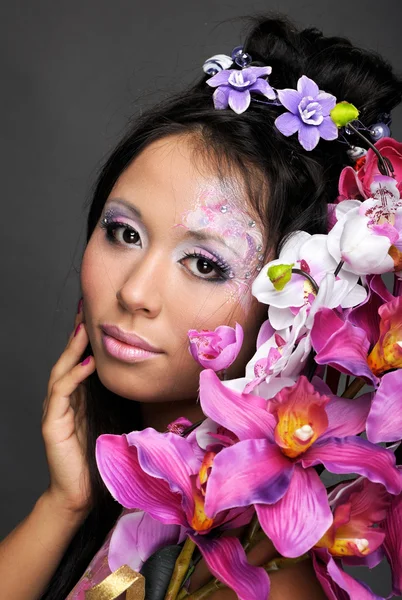 Portrait of asian beauty girl with flowers — Stok Foto