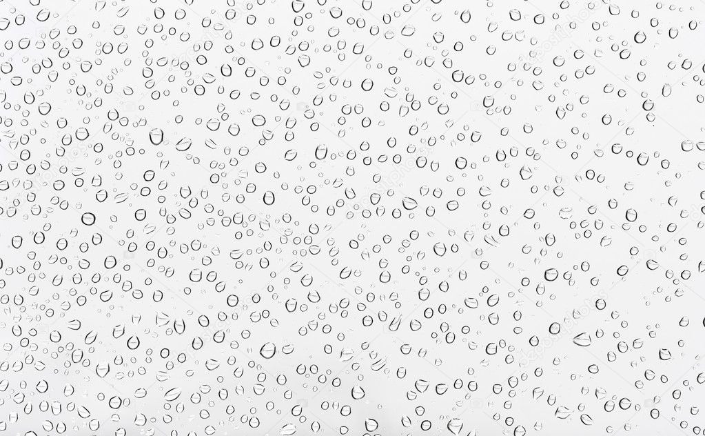 Many little water drops on glass