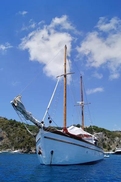 stock image The yacht in a bay in a sunny day