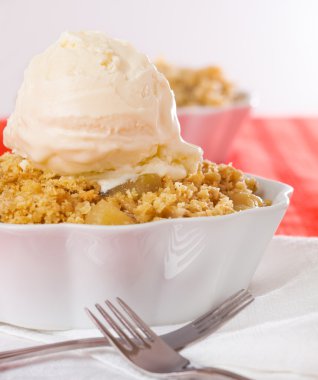 Apple crumble with ice cream clipart